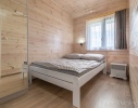 Apartamenty Amelia Apartamenty w domkach drewnianych Amelia_sypialnia